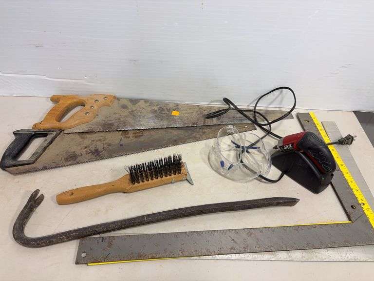 Flat of tools including saws, t-square, pry bar, Skil drill & more