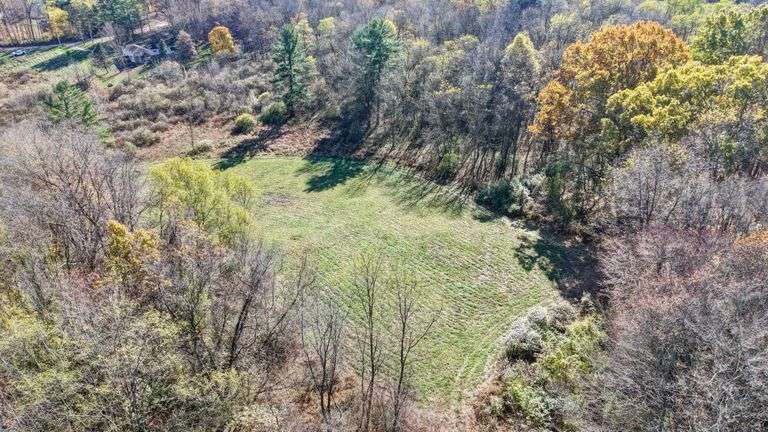 20.16 Acres Open and Wooded. 23.28’ frontage on Upper Gilchrist Rd