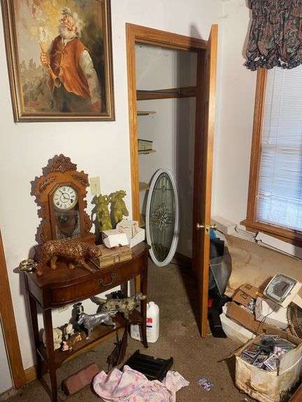 Antique wooden stand w/ figurines, binders w/ stamps & more