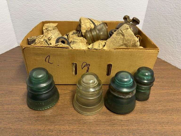 Box of old train insulators