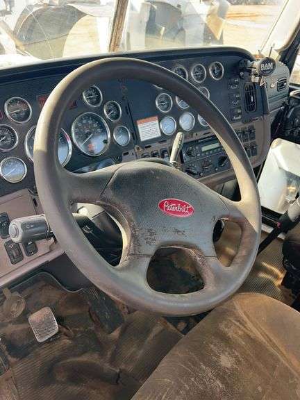 2012 Peterbilt 388 showing 48,817 mi, 9,224 hrs - runs