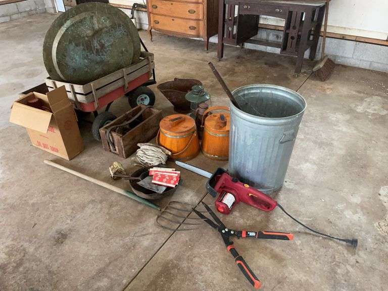 Wagon, pulleys, skillets, electric chainsaw, tin can, pitchfork, and more