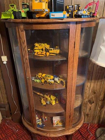 Curved Display cabinet 34”w x 57”h x 15”d contents not included