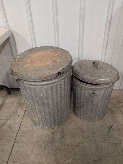 (2) galvanized metal bins with lids - 18" and 23" tall