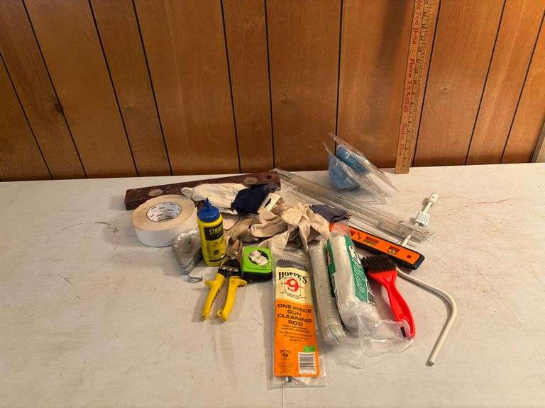 Miscellaneous tools, gloves, and pistol cleaning rod ￼