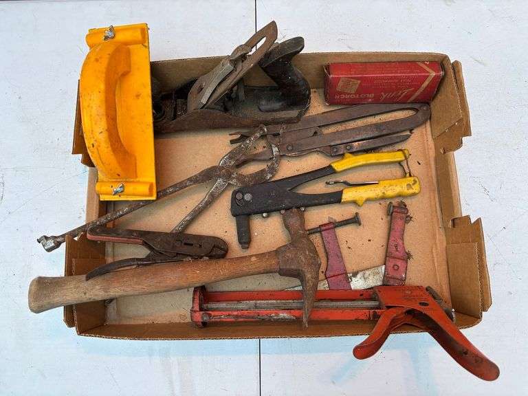 Hand plane ,hammer, riveter, and assorted tools ￼