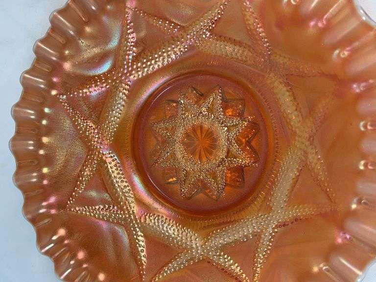 Dugan Ski Star peach opalescent carnival glass bowl.