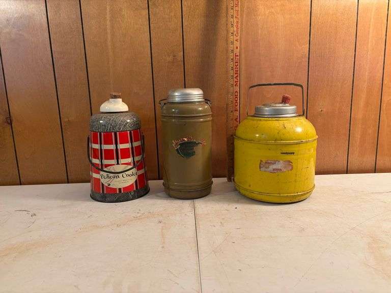 3- vintage water jugs