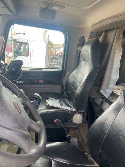 2013 Peterbilt 367 showing 63,847 mi, 9,758 hrs -