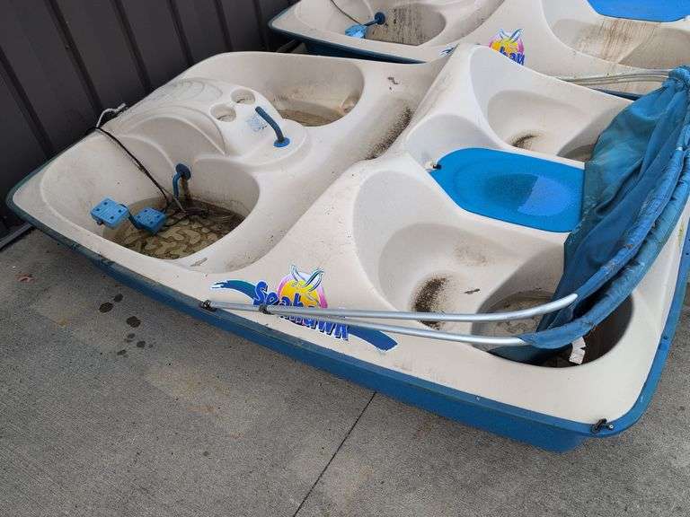 Seahawk 5-person paddle boat with ripped canopy - as is