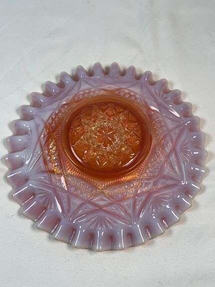 Dugan Ski Star peach opalescent carnival glass bowl.