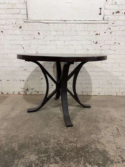 42”W x 42”L x 30” H round table with metal base 