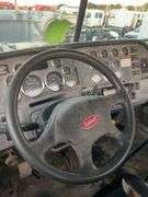 2015 Peterbilt 389 showing 53,258 mi, 8,978 hrs- runs