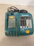 (2) Makita drills w/ battery charger - works