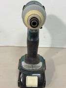 (2) Makita drills w/ battery charger - works