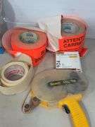 Lot of shop supplies including scotch tape dispenser, fire extinguisher, paint suits and more