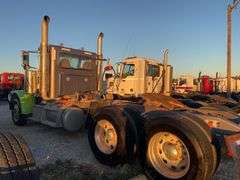 2015 Peterbilt 389 showing 53,258 mi, 8,978 hrs- runs