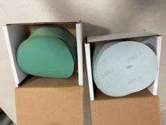 Flat of palm sander discs of various grits