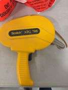 Lot of shop supplies including scotch tape dispenser, fire extinguisher, paint suits and more