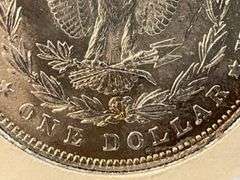 1878 Morgan Dollar – 7/8 Tail Feathers V