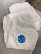 Lot of shop supplies including scotch tape dispenser, fire extinguisher, paint suits and more