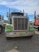 2015 Peterbilt 389 showing 53,258 mi, 8,978 hrs- runs