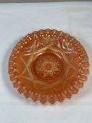 Dugan Ski Star peach opalescent carnival glass bowl.