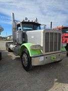2015 Peterbilt 389 showing 53,258 mi, 8,978 hrs- runs