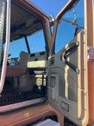 2015 International 9900 showing 218,605 mi, 6,078 hrs- runs