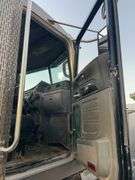 2015 Peterbilt 389 showing 53,258 mi, 8,978 hrs- runs