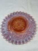 Dugan Ski Star peach opalescent carnival glass bowl.