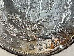 1878 Morgan Dollar – 7/8 Tail Feathers V