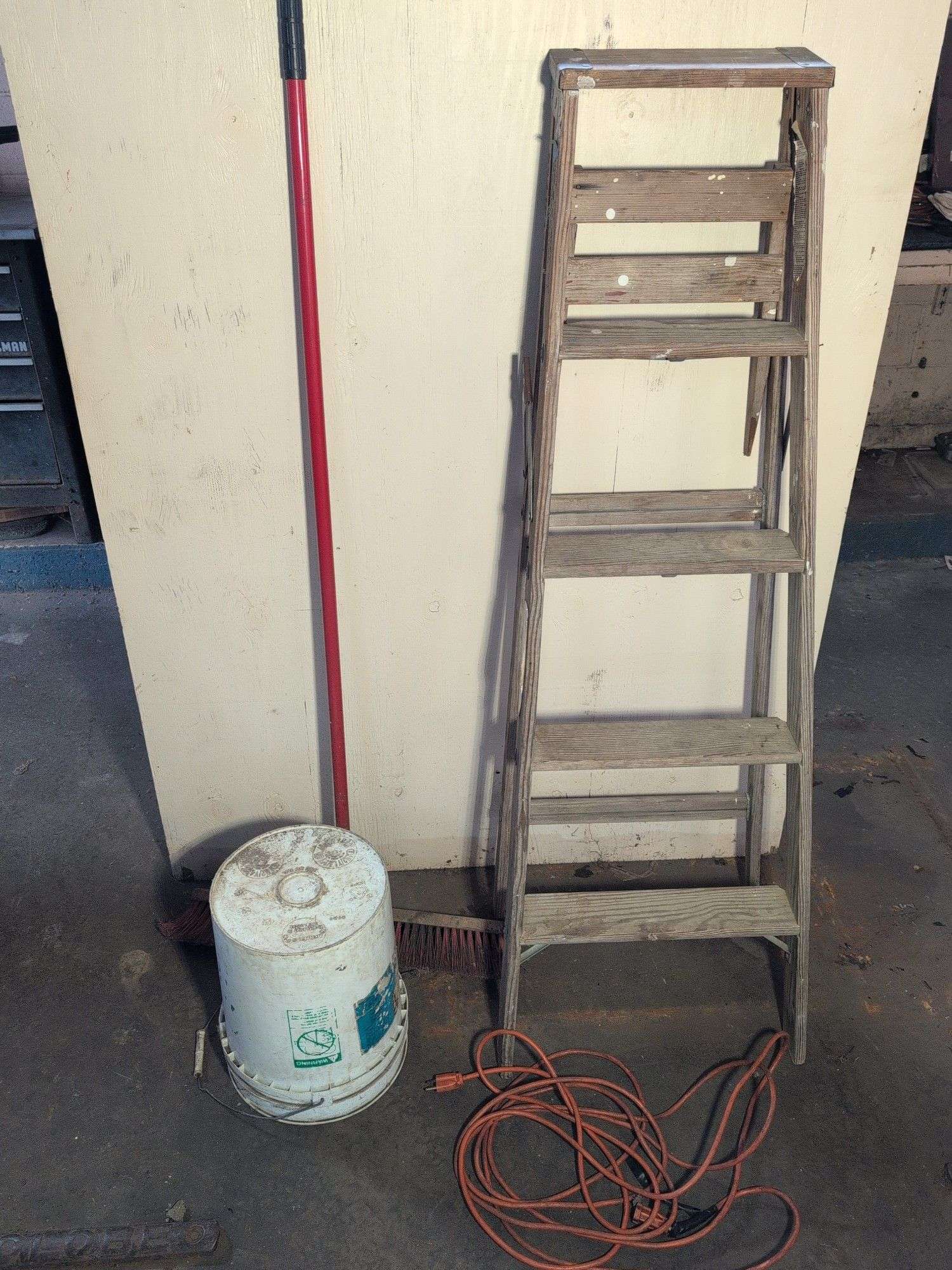 5’ wooden ladder, shop broom, bucket, and extension cord