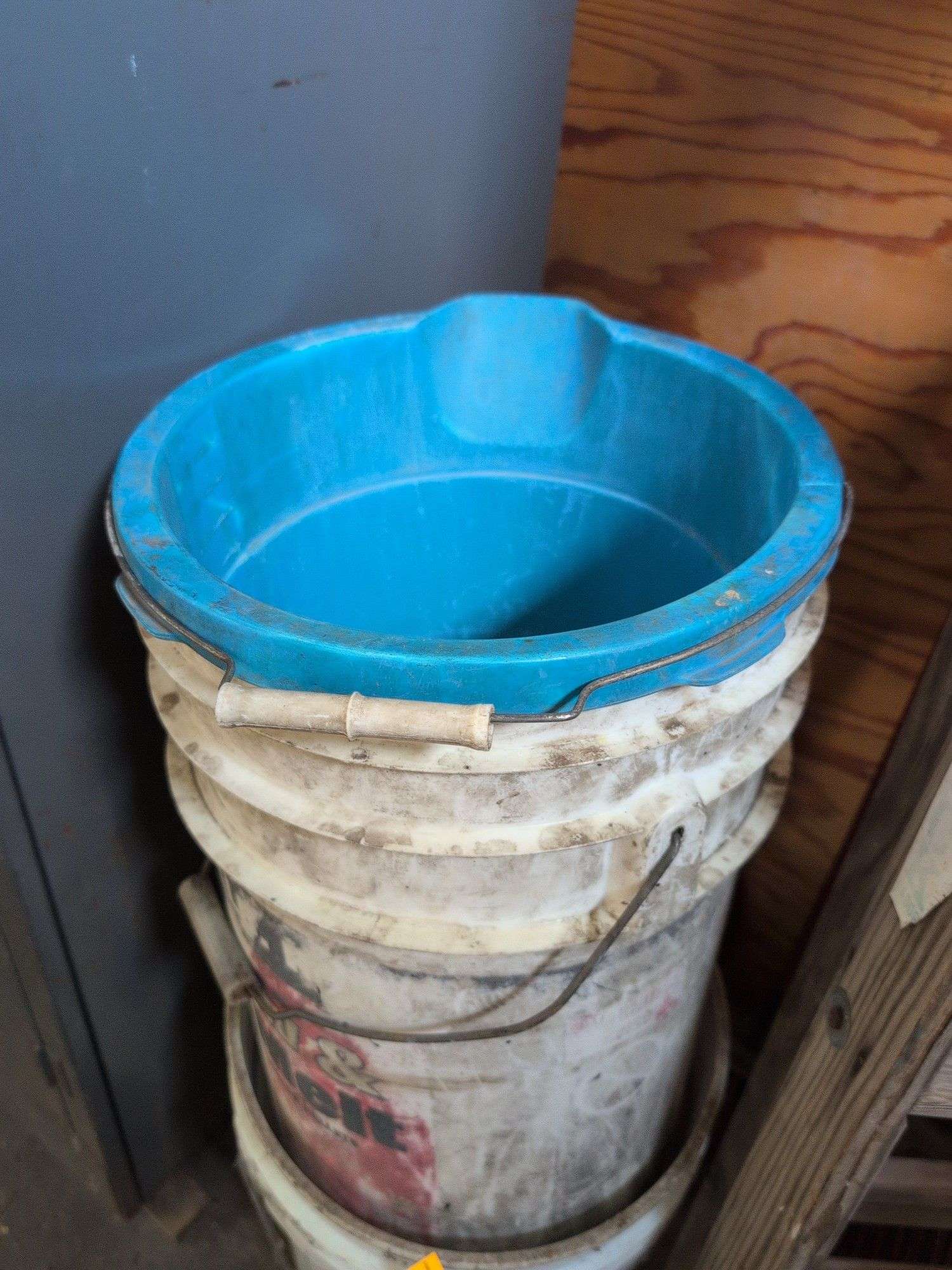 5’ wooden ladder, shop broom, bucket, and extension cord