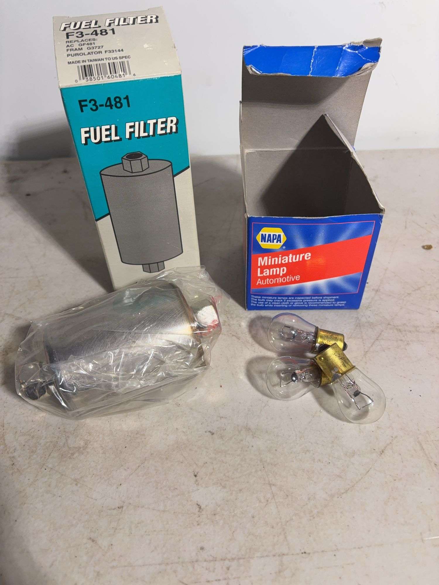 Fuel filter, Compact fluorescent lights, safety glasses, masking tape and more - see photos