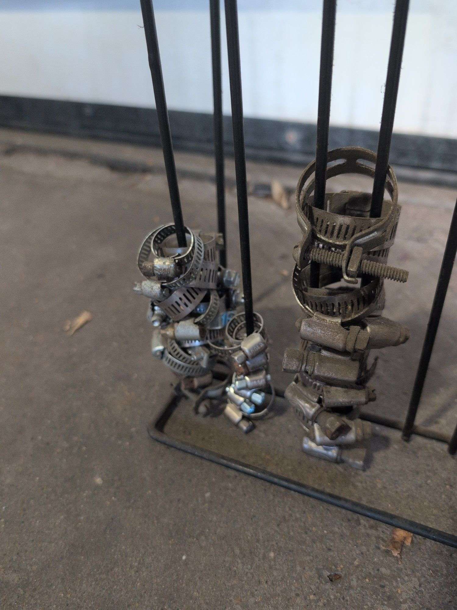 NAPA metal rack with hose clamps