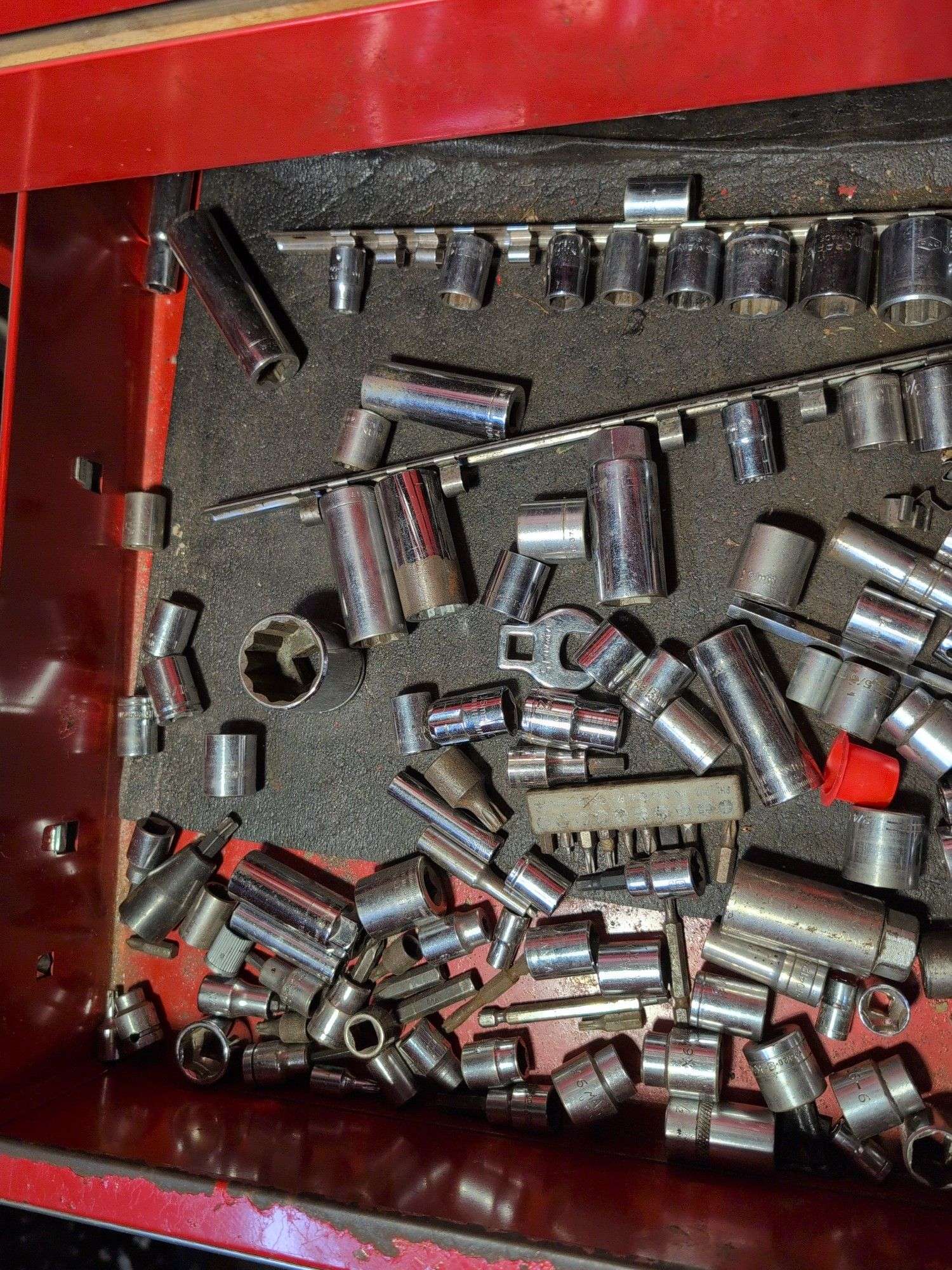 Large assortment of sockets and extenders
