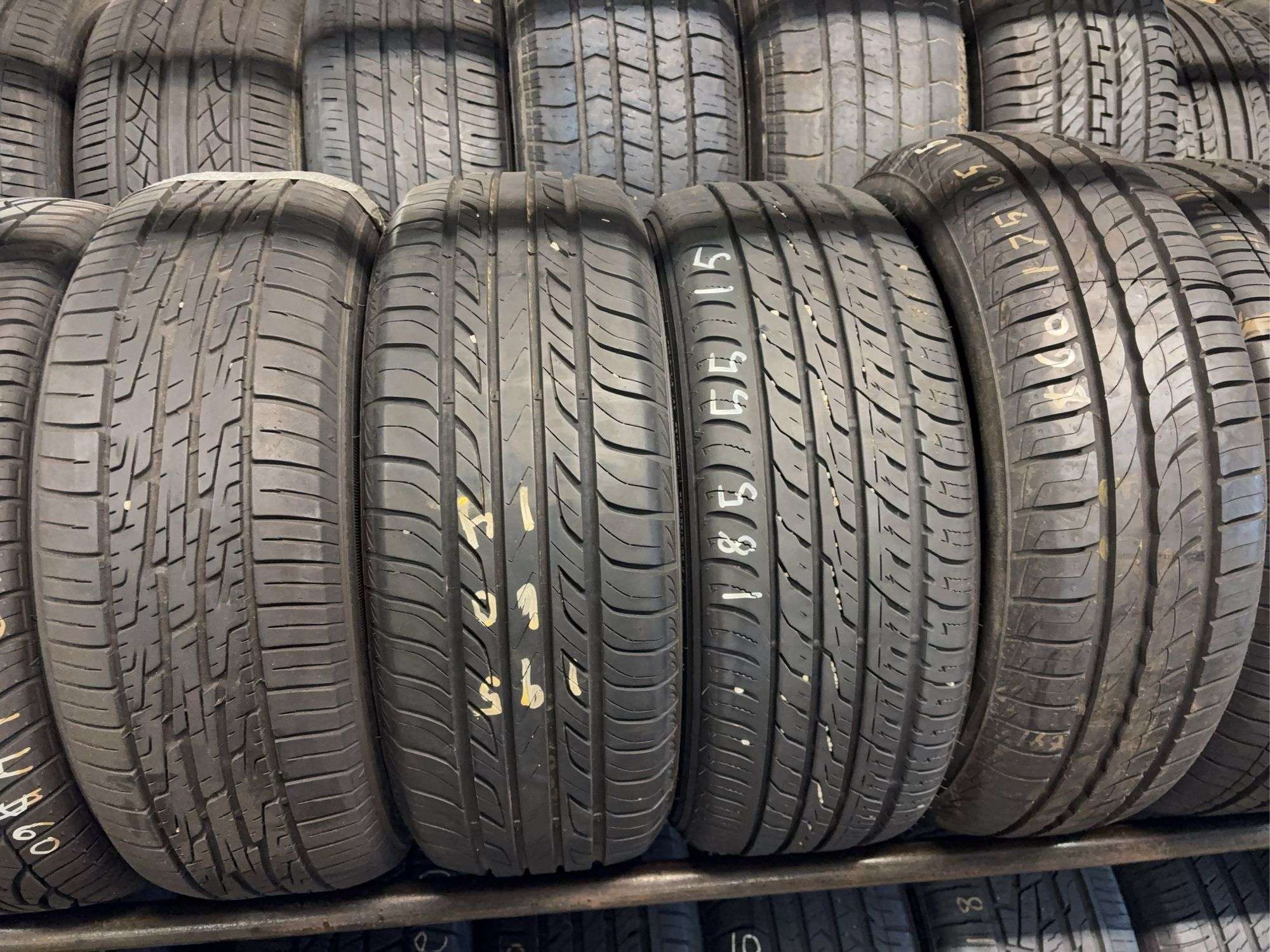 (4) miscellaneous tires like new - (2) 15", (2) 14" - see photos