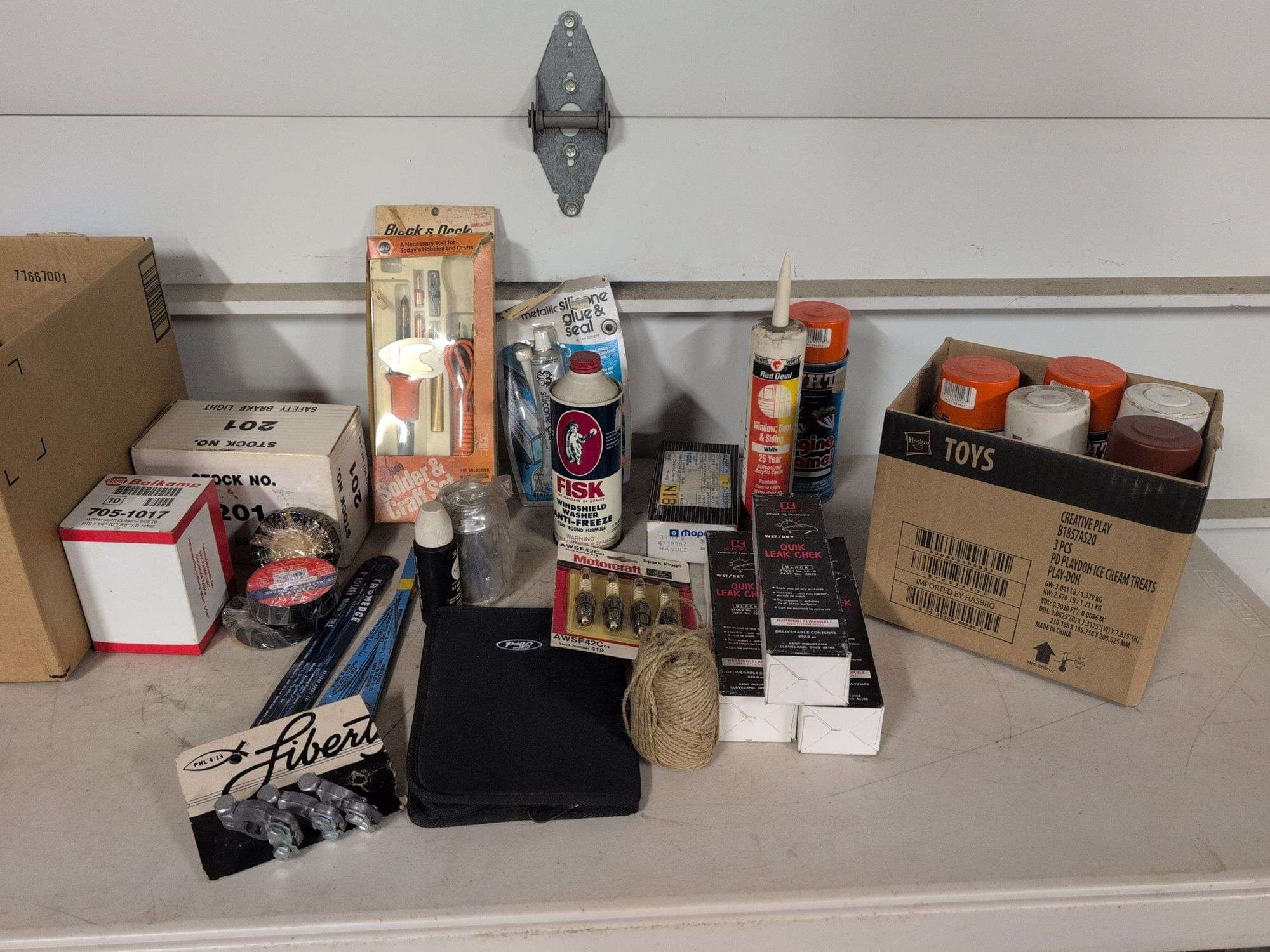 Electrical tape, engine enamel, new spark plugs, and more