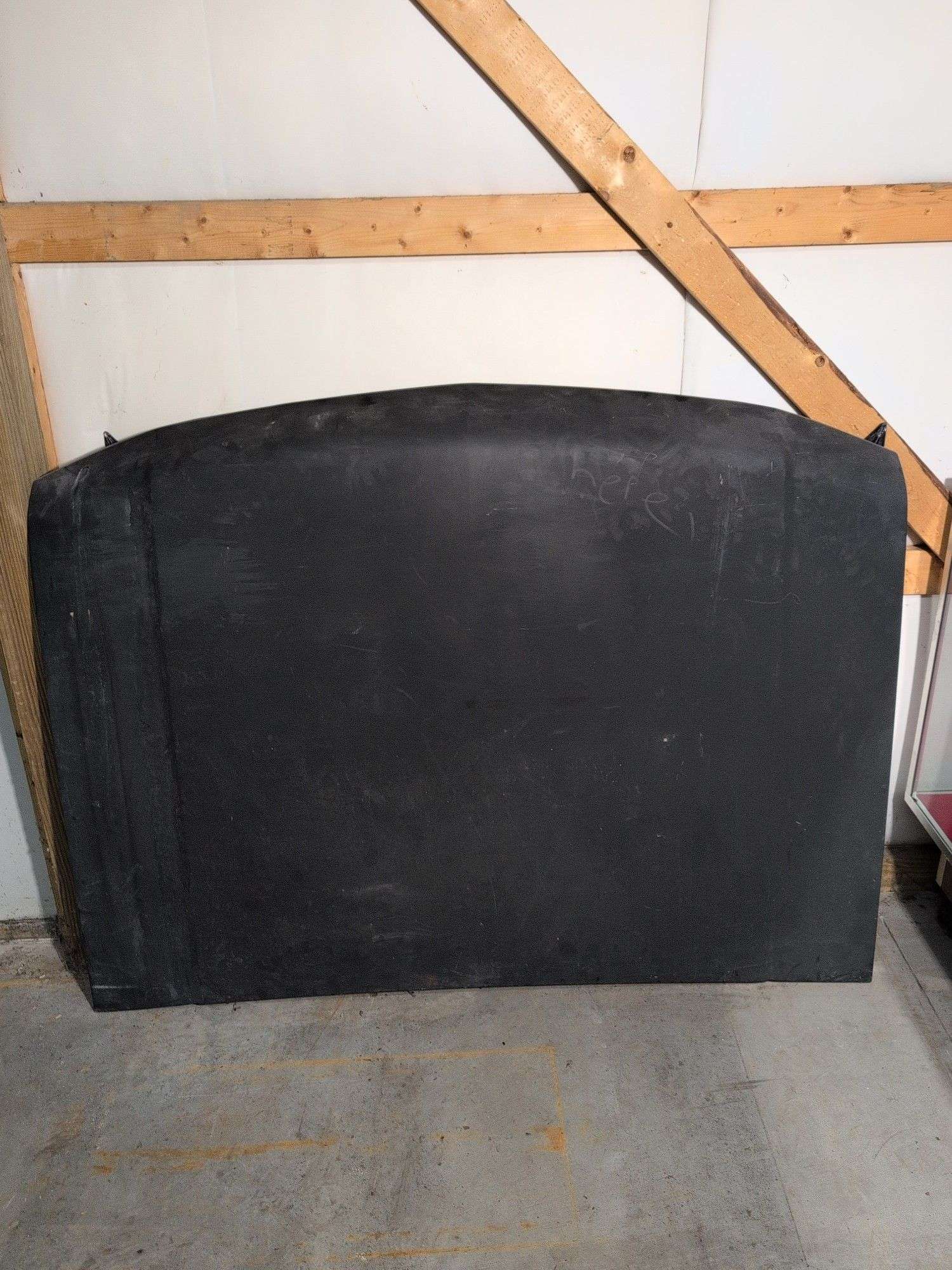 Black Chrysler vehicle hood - see photos