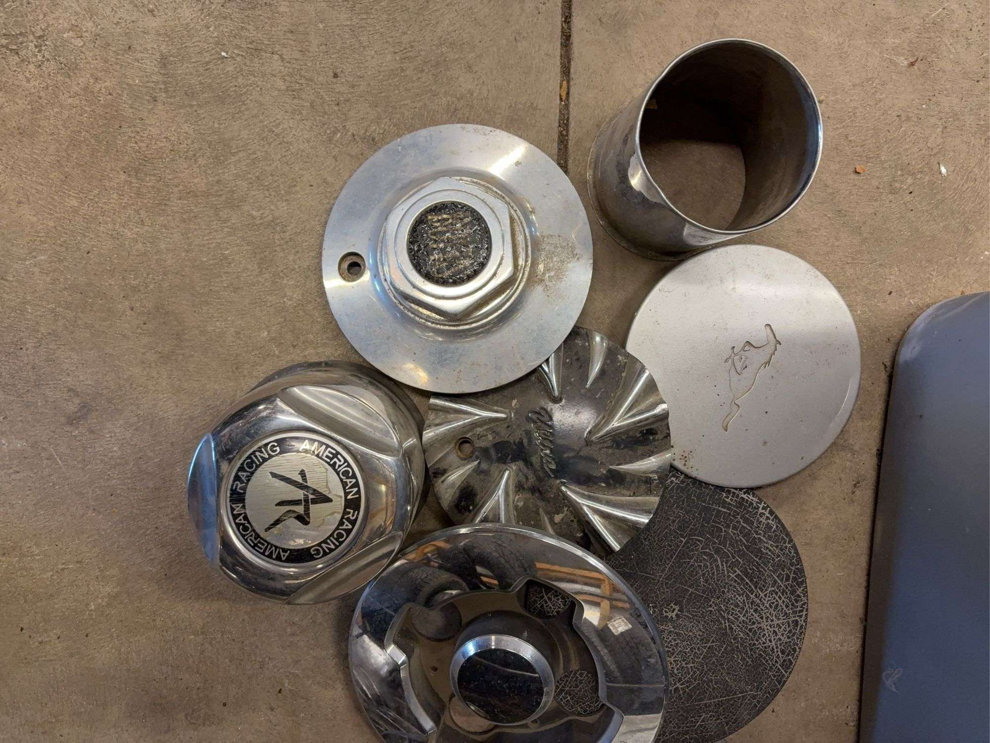 Tote miscellaneous hub caps and parts -American Racing, Ultra, Boyd’s and more