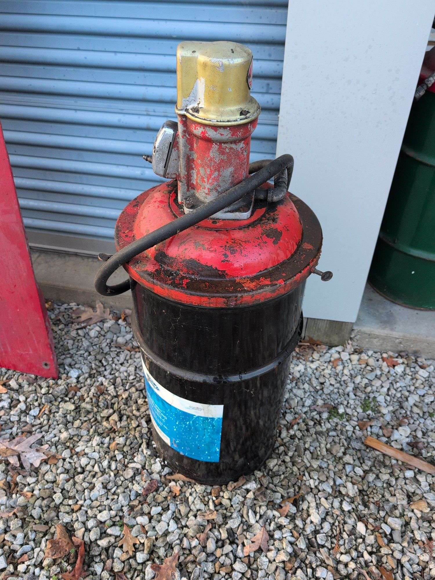 Ford airless spray undercoating with Balcrank industrial pump - appears empty