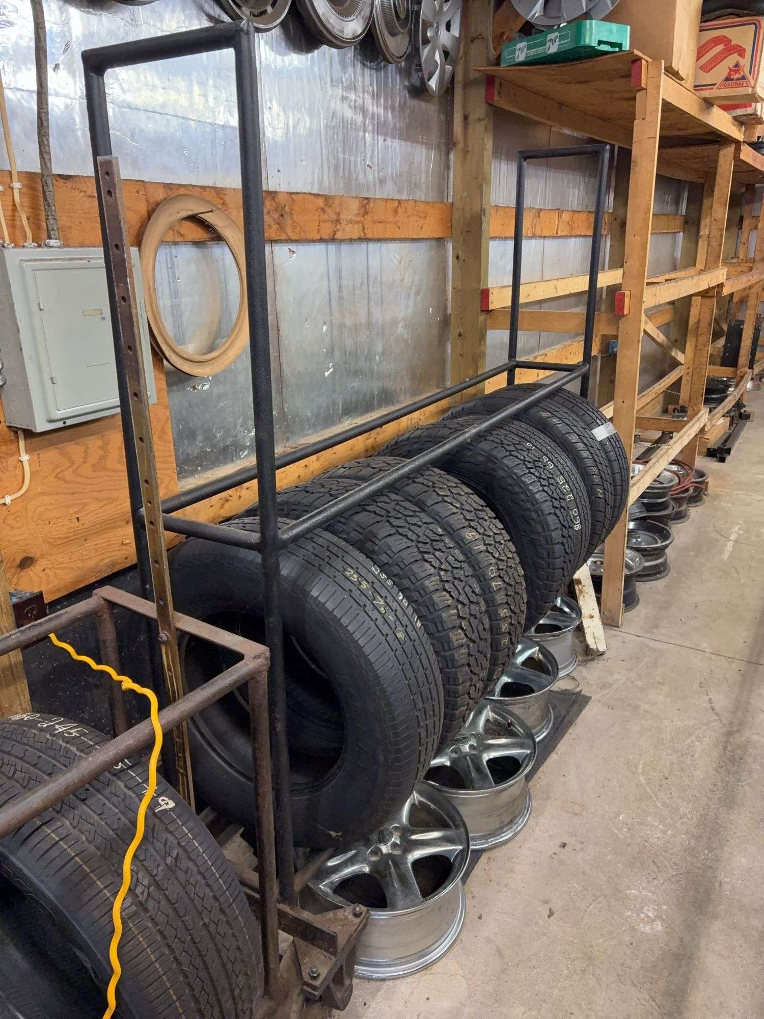 Metal tire rack on wheels - 86" x 14" x 80"