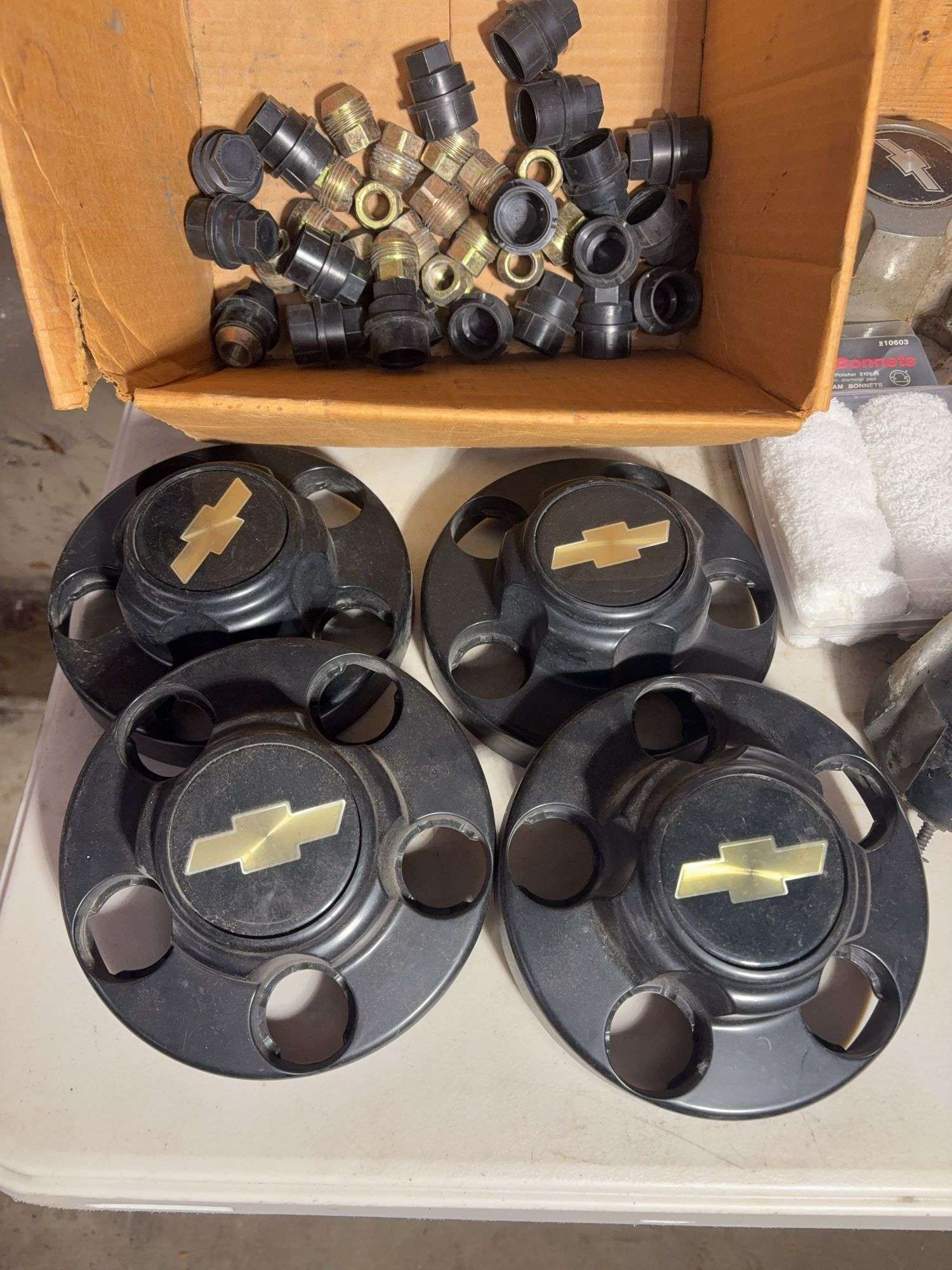 Chevy hubcap parts and other items