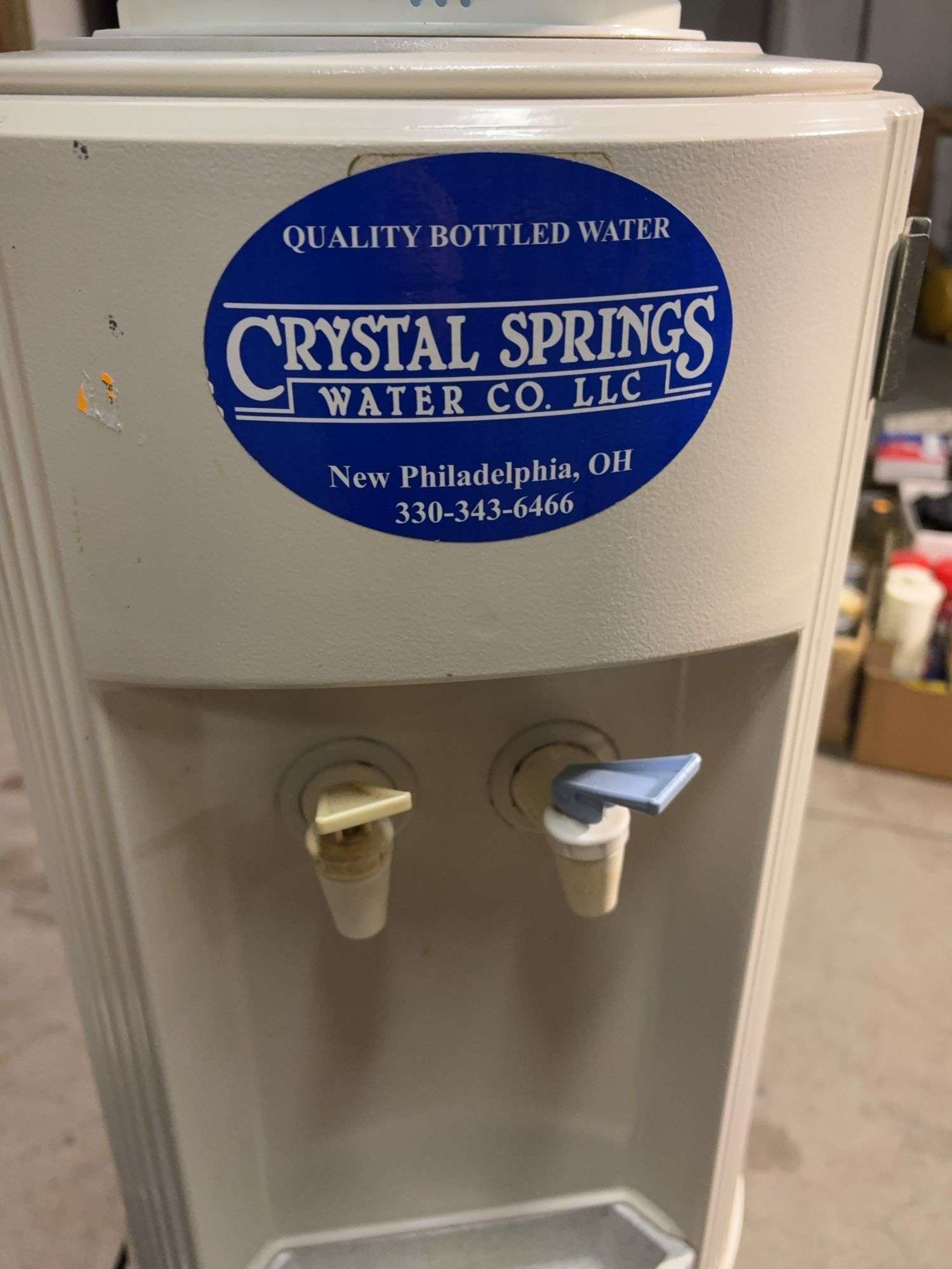 Crystal Springs water cooler with (2) jugs