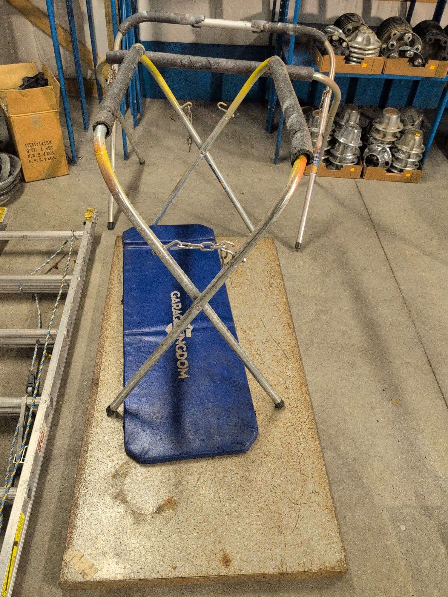 (2) portable work stands, metal top, creeper mat