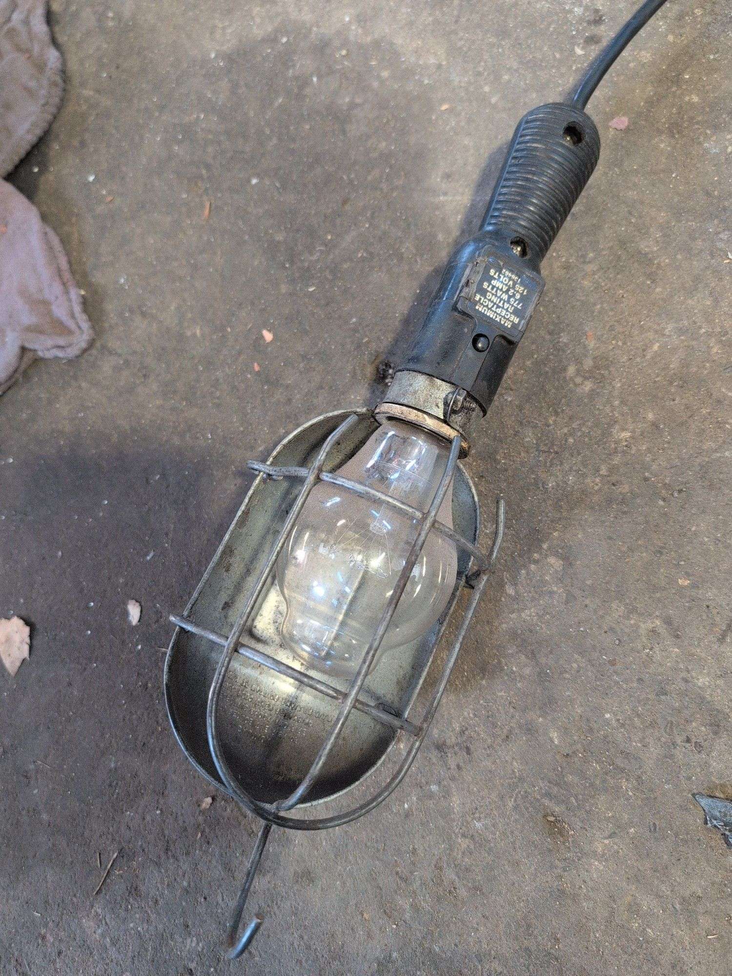 Work light on extension reel and suction gun