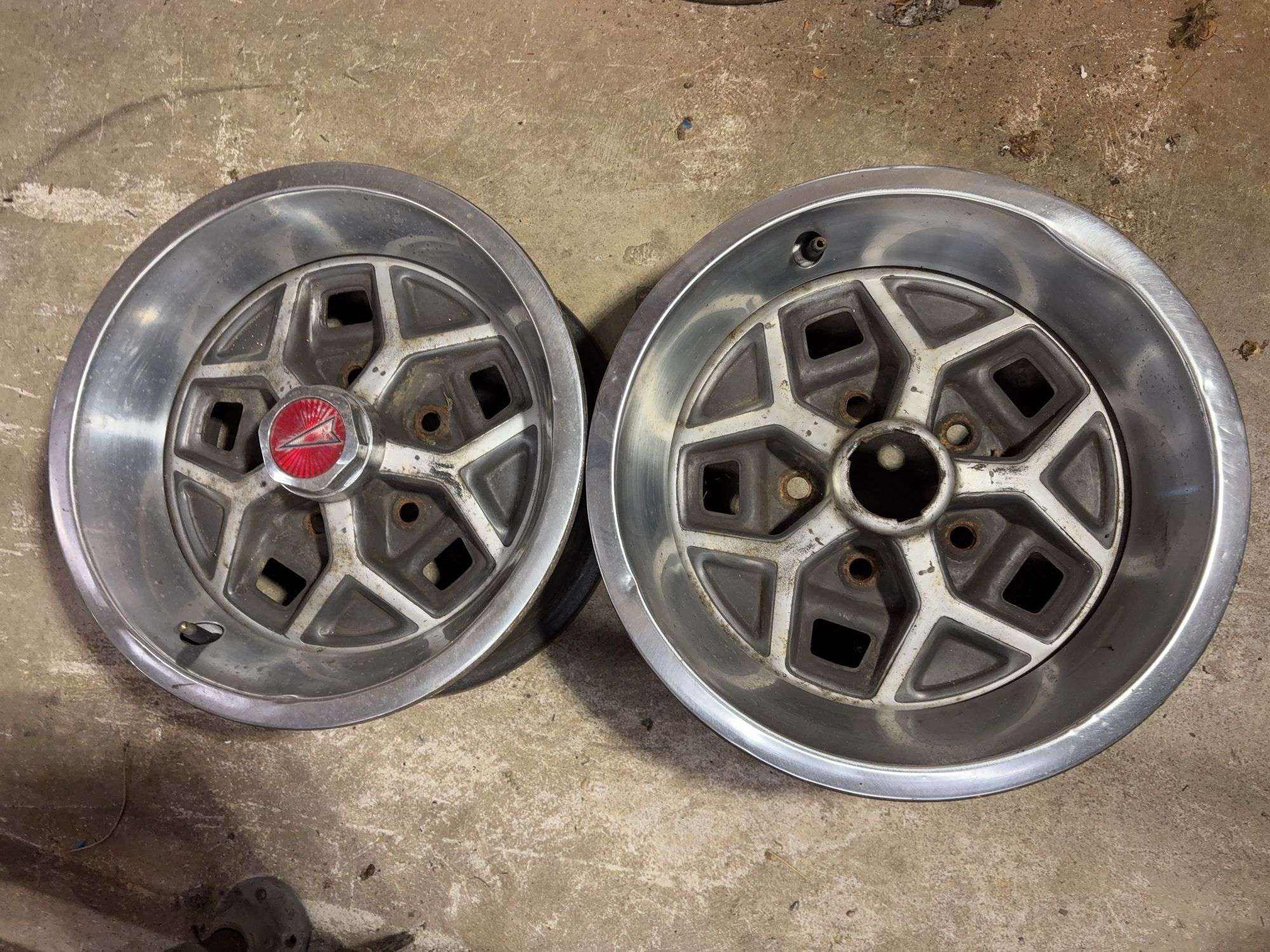 (2) 14" Pontiac wheel rims - see photos
