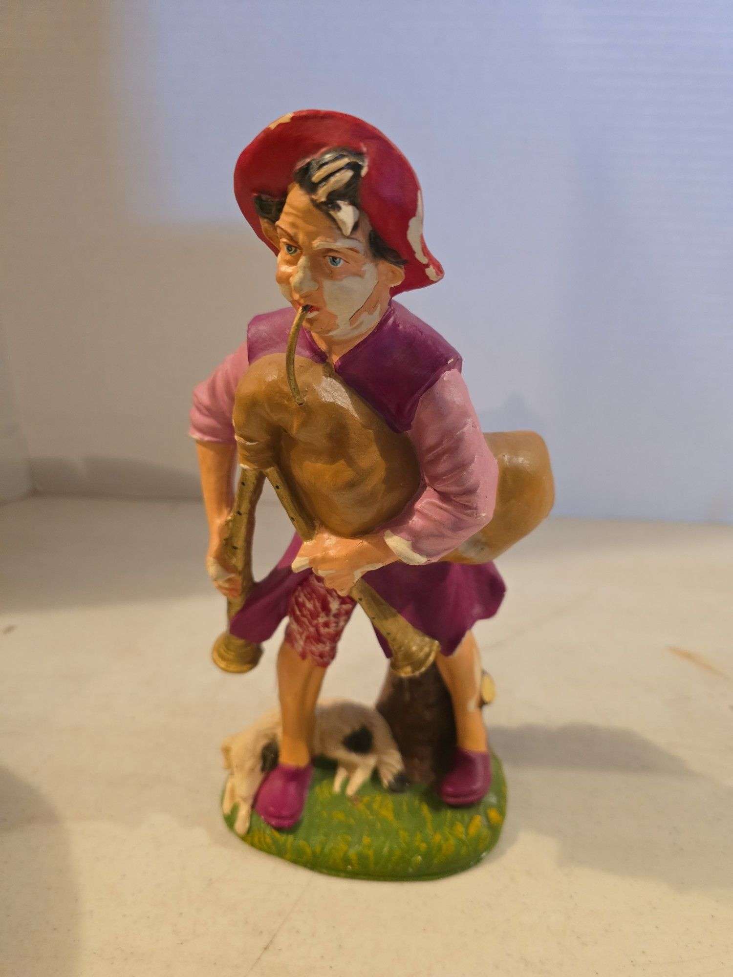 BAGPIPE PLAYER WITH DOG BANK