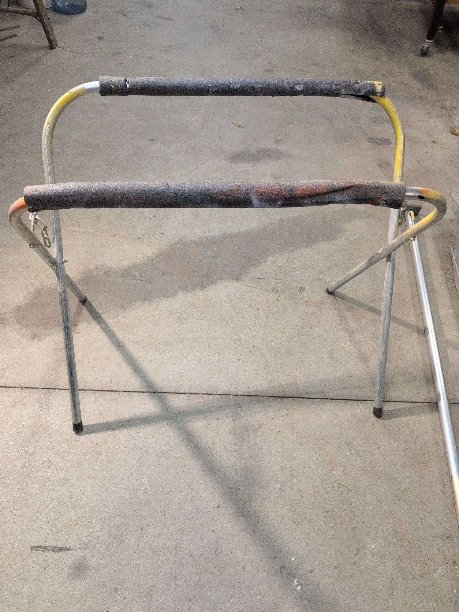 (2) portable work stands, metal top, creeper mat